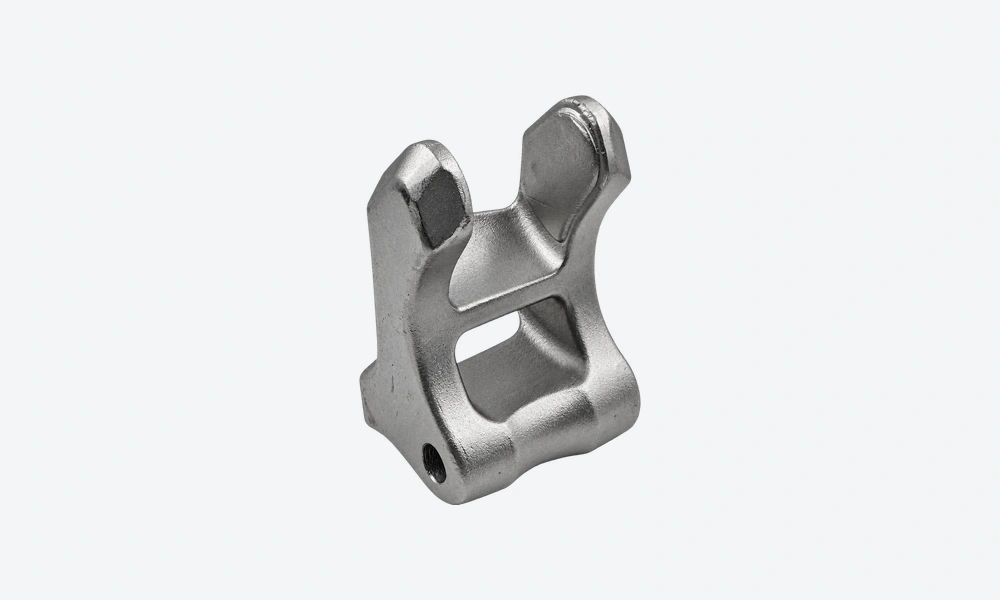 Inner view of the stainless steel fork showing the broadened arm ends, connecting bridge and rear window.