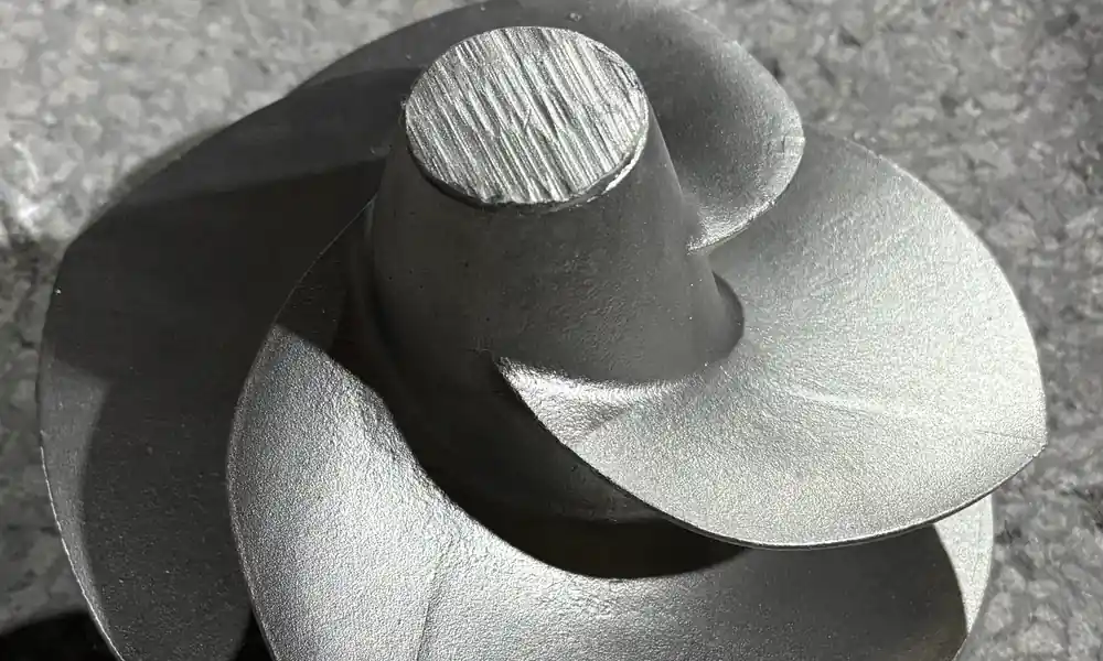 Close view of the impeller's curved vane surfaces and their connections to the central hub.